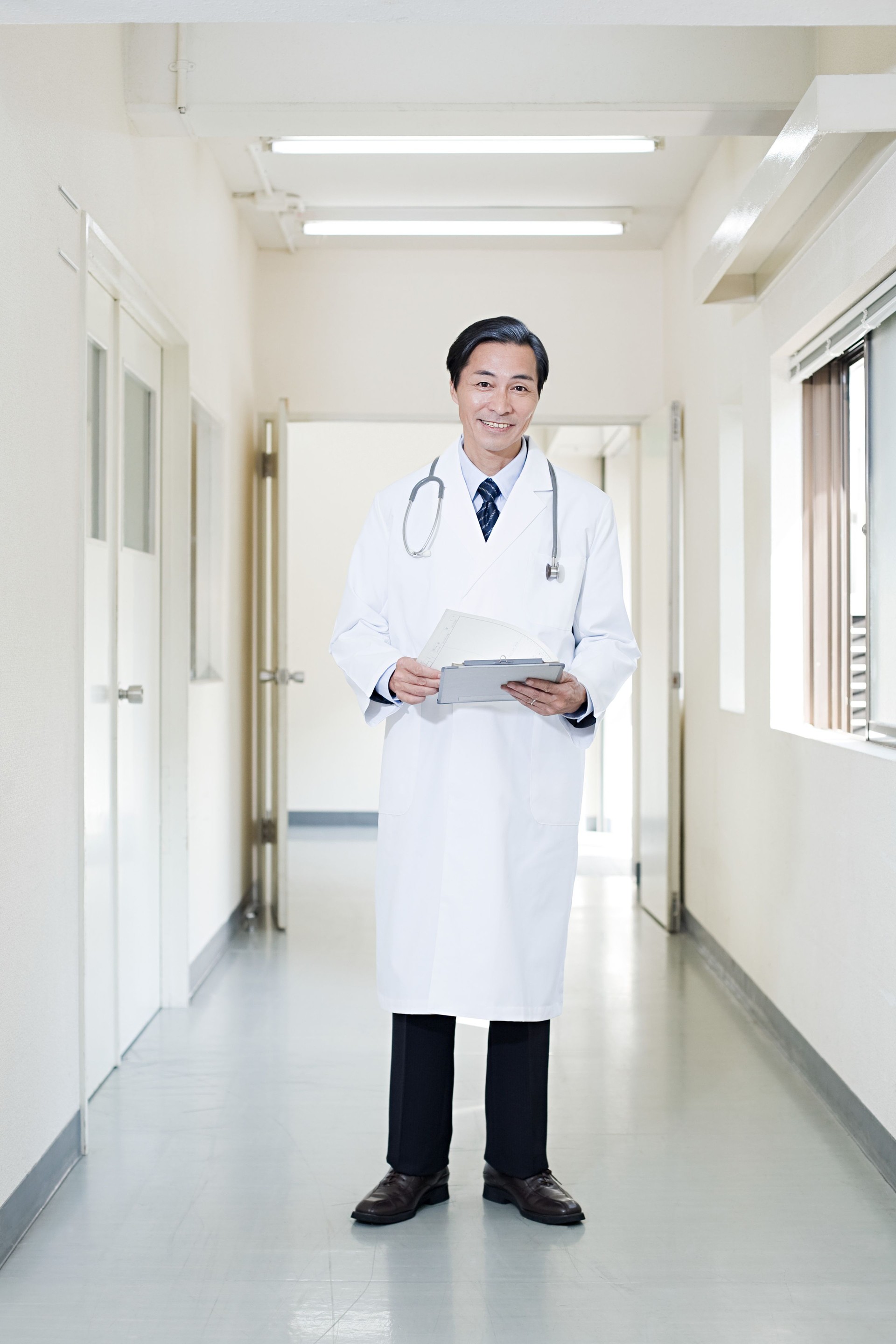 Doctor in hospital corridor